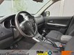 Suzuki Grand Vitara - 2.0-16V Exclusive Trekhaak/ Cruise/ Airco/ Nette auto - 1 - Thumbnail