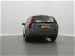 Volvo V50 - 1.6D EDITION I / AIRCO-ECC / CRUISE CONTR. / EL. PAKKET / RADIO-CD / TREKHAAK / *APK 01- - 1 - Thumbnail