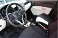 Suzuki Ignis - 1.2 Comfort Airco / Bluetooth / UIT VOORRAAD LEVERBAAR Vanaf € 229, - p.mnd 049258897 - 1 - Thumbnail