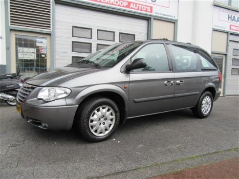 Chrysler Voyager - 3.3i V6 SE 7Pers Automaat Airco Navi Trekhaak Crusctrl 2e.Eige - 1