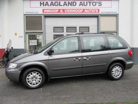 Chrysler Voyager - 3.3i V6 SE 7Pers Automaat Airco Navi Trekhaak Crusctrl 2e.Eige - 1