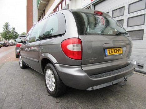 Chrysler Voyager - 3.3i V6 SE 7Pers Automaat Airco Navi Trekhaak Crusctrl 2e.Eige - 1