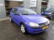 Opel Corsa - 1.0-12V Comfort BEL 06-48872793 - 1 - Thumbnail