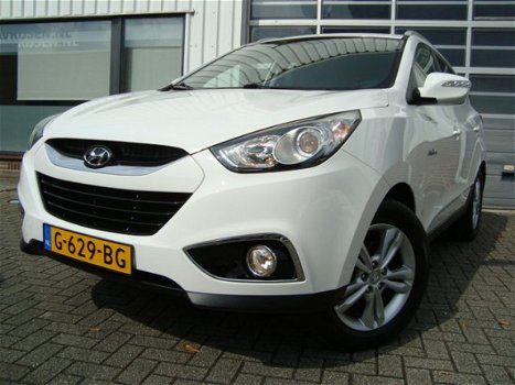 Hyundai ix35 - DYNAMIC MPV HOGE INSTAP NAVIGATIE CAMERA ECC CRUISE LMV PDC HALF LEDER TREKHAAK - 1