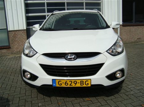 Hyundai ix35 - DYNAMIC MPV HOGE INSTAP NAVIGATIE CAMERA ECC CRUISE LMV PDC HALF LEDER TREKHAAK - 1