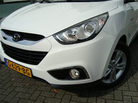 Hyundai ix35 - DYNAMIC MPV HOGE INSTAP NAVIGATIE CAMERA ECC CRUISE LMV PDC HALF LEDER TREKHAAK - 1