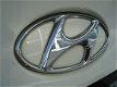 Hyundai ix35 - DYNAMIC MPV HOGE INSTAP NAVIGATIE CAMERA ECC CRUISE LMV PDC HALF LEDER TREKHAAK - 1 - Thumbnail