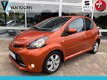 Toyota Aygo - 1.0 VVT-i Dynamic Orange, Airco, Automaat - 1 - Thumbnail