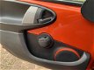 Toyota Aygo - 1.0 VVT-i Dynamic Orange, Airco, Automaat - 1 - Thumbnail
