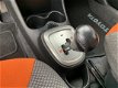 Toyota Aygo - 1.0 VVT-i Dynamic Orange, Airco, Automaat - 1 - Thumbnail