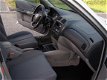 Mazda 323 Fastbreak - 1.6i Comfort / airco - 1 - Thumbnail