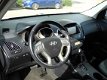 Hyundai ix35 - 2.0i Aut. Style NAVI+CAMERA/CLIMA/CRUISE/LMV - 1 - Thumbnail