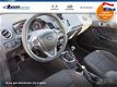 Ford Fiesta - 1.0 100pk. EcoBoost Titanium NAVI/PDC V+A/ 1e particuliere eigenaar - 1 - Thumbnail