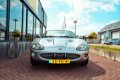 Jaguar XKR - 4.0 V8 Coupé AUTOMAAT/ LEDER/ ECC/ AIRCO/ EL.RAMEN/ LMV/ /CV/ NL-AUTO MET BOEKJES - 1 - Thumbnail