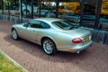 Jaguar XKR - 4.0 V8 Coupé AUTOMAAT/ LEDER/ ECC/ AIRCO/ EL.RAMEN/ LMV/ /CV/ NL-AUTO MET BOEKJES - 1 - Thumbnail