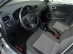 Volkswagen Polo - 1.2 TDI BlueMotion Comfortline | Airco | Navigatie | Cruise Control | LM-Velgen | - 1 - Thumbnail