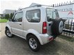 Suzuki Jimny - 1.3 Exclusive M2014/AIRCO/AUTOM/PDC/4X4 - 1 - Thumbnail