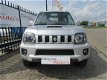 Suzuki Jimny - 1.3 Exclusive M2014/AIRCO/AUTOM/PDC/4X4 - 1 - Thumbnail