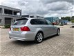 BMW 3-serie Touring - 320d High Executive | Pano | Navi - 1 - Thumbnail