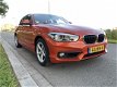 BMW 1-serie - 118d Essential automaat, nav, bomvol optie's - 1 - Thumbnail