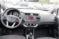 Kia Rio - 1.1 CRDi Plus Pack Euro 5 airco, radio cd speler, elektrische ramen, afneembare trekhaak, - 1 - Thumbnail