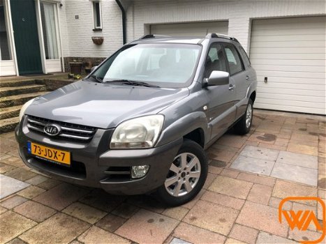 Kia Sportage - 2.0 CVVT | 4WD | Cruise | Half-leer | Trekh | Airco - 1