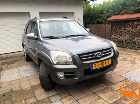 Kia Sportage - 2.0 CVVT | 4WD | Cruise | Half-leer | Trekh | Airco - 1