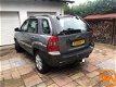 Kia Sportage - 2.0 CVVT | 4WD | Cruise | Half-leer | Trekh | Airco - 1 - Thumbnail