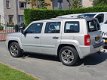 Jeep Patriot - 2.4 4*4 LIMITED ADVENTURE LEDER TREKHAAK - 1 - Thumbnail