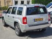 Jeep Patriot - 2.4 4*4 LIMITED ADVENTURE LEDER TREKHAAK - 1 - Thumbnail