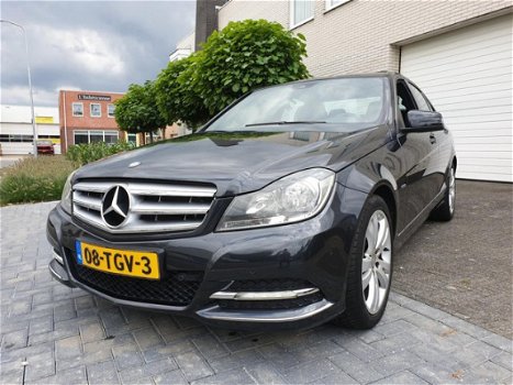 Mercedes-Benz C-klasse - 180 Business Class 125 Avantgarde Automaat Leder Navi Open Dak Nieuwstaat - 1