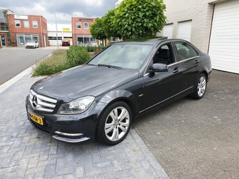 Mercedes-Benz C-klasse - 180 Business Class 125 Avantgarde Automaat Leder Navi Open Dak Nieuwstaat - 1