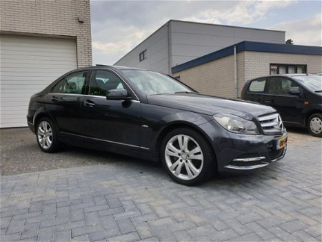 Mercedes-Benz C-klasse - 180 Business Class 125 Avantgarde Automaat Leder Navi Open Dak Nieuwstaat - 1