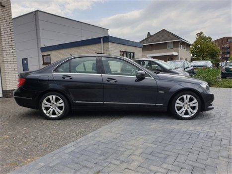 Mercedes-Benz C-klasse - 180 Business Class 125 Avantgarde Automaat Leder Navi Open Dak Nieuwstaat - 1