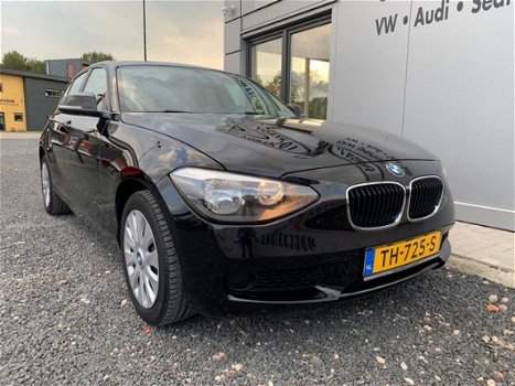 BMW 1-serie - 114I EDITION BUSINESS + NAVI/PDC/STOELVERW - 1