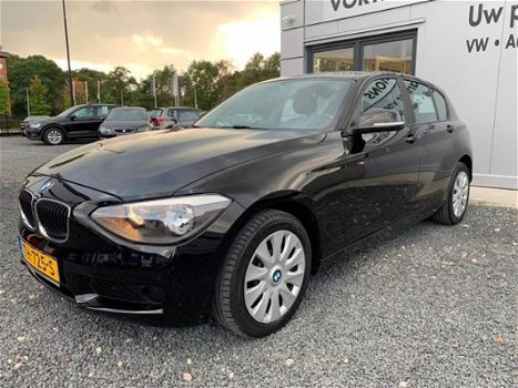 BMW 1-serie - 114I EDITION BUSINESS + NAVI/PDC/STOELVERW - 1