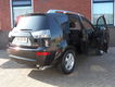 Mitsubishi Outlander - 2.4 Intro Edition 2WD Nette auto | Rijklaar prijs - 1 - Thumbnail