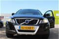 Volvo XC60 - 2.4D FWD LEDER/NAVI/VOLLEDIG ONDERHOUDEN - 1 - Thumbnail