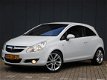 Opel Corsa - 1.2-16V Cosmo Sport uitv, Automaat, Climate&Cruise - 1 - Thumbnail