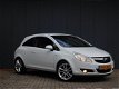 Opel Corsa - 1.2-16V Cosmo Sport uitv, Automaat, Climate&Cruise - 1 - Thumbnail