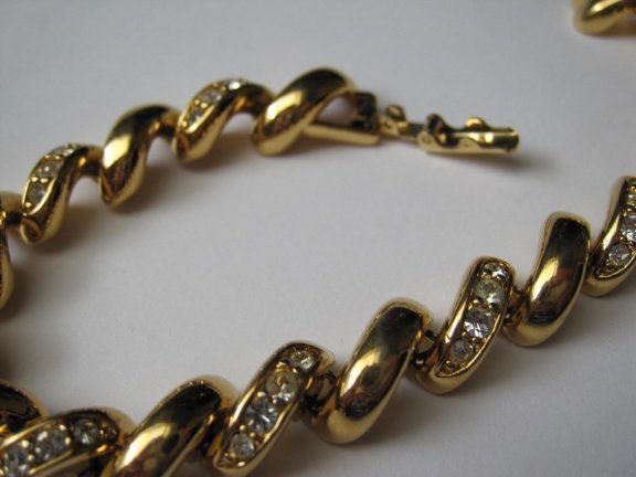 Armband Joan Rivers goudkleurig gedraaide schakel 19 cm. - Afbeelding 4