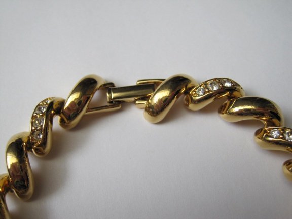 Armband Joan Rivers goudkleurig gedraaide schakel 19 cm. - Afbeelding 5