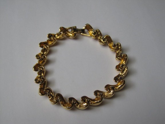 Armband Joan Rivers goudkleurig gedraaide schakel 19 cm. - Afbeelding 6