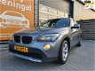 BMW X1 - 1.8d sDrive 6 versnellingen, Airco en TREKHAAK - 1 - Thumbnail