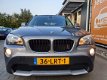 BMW X1 - 1.8d sDrive 6 versnellingen, Airco en TREKHAAK - 1 - Thumbnail
