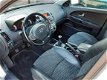 Kia Cee'd - Ceed 1.6 CRDI Wagon X-ecutive ECC Trekhaak NL-auto - 1 - Thumbnail