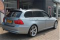 BMW 3-serie Touring - 318i High Exec. Automaat / Xenon/ 19'' LMV/ Leer/ Pano. Schuifdak/ PDC V+A - 1 - Thumbnail
