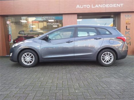 Hyundai i30 - 1.4 i-Drive - airco, parkeersensoren, lm velgen etc - 1