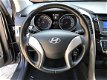 Hyundai i30 - 1.4 i-Drive - airco, parkeersensoren, lm velgen etc - 1 - Thumbnail