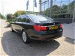 BMW 7-serie - 740Li lang/zwart leder/navi/schuifd/boekjes/N.A.P - 1 - Thumbnail